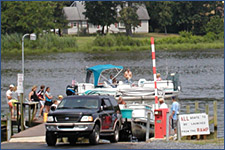 Truck pulling boat out of the marina